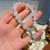 Pulsera Nueva China Tianshan Cui para Mujer Moda Cuerda Elástica Anillo Único Perla de Agua Dulce Verde Blanco Cuentas Redondas Pulsera Nicho Venta al por Mayor