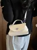 Bolso pequeño súper popular transfronterizo para mujer, nuevo modelo de verano 2026, bolso de hombro de alta gama, bolso cuadrado pequeño cruzado