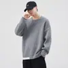 Suéter simple de punto grueso con cuello redondo para hombre, nuevo estilo casual otoño e invierno 2026, top pullover holgado versátil para hombre