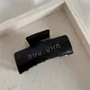 Elegante pinza para agarrar cartas de doble cara clip de tiburón de lujo ligero francés clip para coleta de viajero accesorios para el cabello de alta gama de lujo al por mayor
