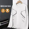 Camiseta informal de manga larga con cuello redondo, color liso, versátil, para hombre, otoño 2026, corte holgado, top moderno
