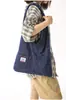 Bolsa de Mezclilla de Gran Capacidad Yuezi para Mujer 2026 Nueva Ligera Versátil para el Trabajo Bolso de Hombro Estilo Perezoso Bolsa de Lona