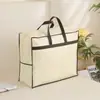 Bolsa de almacenamiento personalizada de tela no tejida para edredones, con cremallera y diseño reforzado, bolsa de embalaje portátil de cuatro piezas para mantas, hecha a medida por el fabricante