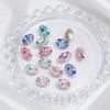 Dongzhou Diamante 12*8 Corte de Fuegos Artificiales Ovalado Diamante para Uñas Super Brillante Cristal K9 de Alta Calidad Forma de Dan Diamante con Base Puntiaguda Accesorios para Uñas