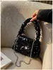 Bolsa Feminina 2026 Design Individual de Nicho Fashion Simples Nova Elegante Estilo Coreano Bolsa de Ombro Único Transversal Pequena Quadrada Tendência