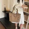 Bolso tote transfronterizo simple de gran capacidad, nuevo bolso de mano de moda casual, bolso de hombro versátil para el trabajo y los desplazamientos