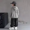 Otoño 2026 Nuevo Sudadera con Capucha Suelta Estampado de Dibujos Animados Retro Americano para Niños Sudadera con Capucha para Niños Moderna