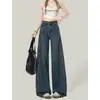 Jeans de pierna ancha azul oscuro estilo americano para mujer, tendencia de otoño, nuevos, de cintura alta, corte holgado, adecuados para figuras tipo pera, con un diseño de pierna recta y fluido.