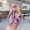 Novo design criativo de chaveiro de carro de bolsa de dinheiro de argila cravejada de diamantes, cheio de diamantes, simbolizando riqueza, presente de pingente de bolsa personalizado
