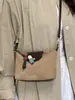 Bolso de axila de color liso de gamuza con diseño de nicho estilo coreano para mujer, nuevo bolso de hombro y cruzado de moda 2026 para el trabajo