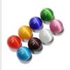 Venta al por mayor de fábrica de adornos coloridos de ojo de gato, adornos para sala de estar, juego de balonmano, piedra de ojo de gato, bola de cristal, bola de Feng Shui
