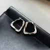 Pendientes Pleateados de Metal Plateado Electrochapado en Oro Real Europeo y Americano para Mujer, Lujo Accesible Nicho Diseño Único, Pendientes y Aretes de Gama Alta