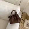 Bolsa Saco Tendência Retrô Simples Nova Primavera 2026 Moda Casual com Textura para Mulheres Bolsa de Ombro Transversal