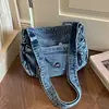 Bolsa Transversal Simples Retrô Feminina 2026 Outono Nova para Uso Externo e no Dia a Dia em Jeans com Alça Única