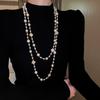 Collar de perlas largas irregulares, estilo francés, ligero, de lujo, elegante, de lana, con cadena, sencillo, de alta gama, al por mayor, para mujer.