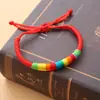 Sencilla nueva cuerda de mano tejida a mano para mujer nudo de diamante geométrico Festival del Bote Dragón cuerda roja pulsera de cuerda colorida al por mayor