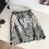 Saia de Alta Qualidade Estilo Europeu e Americano para Mulheres no Verão, Lantejoulas Pesadas Cintura Alta Efeito Emagrecedor Pura Luxúria Sexy Hot Girl Street Curta que Molda o Corpo