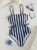 Moda Europeia e Americana Verão 2026 Maiô Feminino de Peça Única para Praia Listrado Costas Nuas Vazado Roupa para Festa de Férias