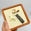 Llévate Riqueza Pronto Llavero Dorado Dibujo Animado Zodiaco Chapado en Oro Colgante de Caballo Pequeño Versátil para Pareja Lindo Adorno Colgante Regalo