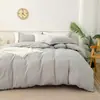 Juego de ropa de cama de cuatro piezas para comercio exterior transfronterizo, funda de edredón de color sólido de una sola pieza, sábana bajera, funda de almohada
