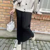 Falda midi de punto plisado estilo coreano para mujer, nueva colección otoño/invierno 2026, falda de paraguas de corte A favorecedora y estilizante de longitud media