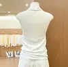 Colete de tricô preto estilo coreano com gola halter e costas abertas para mulheres, novo top sem mangas chique de verão 2026, cor sólida, efeito emagrecedor