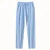 Pantalones Deportivos de Ocio para el Hogar de Estilo Europeo y Americano Transfronterizos para Hombre de Algodón Transpirable de Color Sólido Holgados Modernos de Algodón y Lino