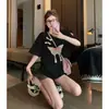 Camiseta Blanca de Manga Corta Estilo Chino para Mujer Verano 2026 Nuevo Estilo Caliente Camiseta con Sentido del Diseño Holgada Talla Grande Manga Media