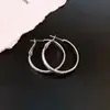 Pendientes de perlas de cola de pez con flores huecas de estilo europeo y americano con aguja de plata, pendientes de temperamento exagerado, pendientes de alta calidad de la industria pesada