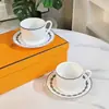 Taza y Platillo de Café de Hueso de Porcelana con Cadena de Hierro Gris H Juego de Té Británico Taza y Platillo para el Té de la Tarde Recomendación de Regalo para el Hogar Caja de Regalo