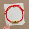 Pulsera de Hilo Rojo de Bebé de Dibujos Animados 2026 Nuevo Estilo Bendición Pequeño Zongzi Pulsera Estilo Chino Festival del Bote del Dragón Hilo de Cinco Colores Ajustable Venta al por Mayor