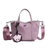 Bolso de Hombro Cruzado para Mujer Estilo Bollo Francés 2025 Nuevo Lona de Nylon Bolso de Mano de Moda Bolso de Hombro Casual de Tela Oxford