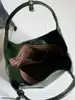 Bolso nuevo de principios de otoño 2026, bolso cubo liso vintage, bolso de mano simple, bolso de hombro a la axila moderno y relajado