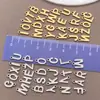 Colgantes de 26 Letras Inglesas Acero Inoxidable Dijes de Letras Doradas Pulsera DIY Collar Accesorios de Joyería Venta al por Mayor