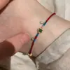Nuevo brazalete tejido de peces koi verde translúcido estilo chino, moderno, exquisito, fresco y versátil para el uso diario.