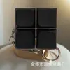 Juguete de Alivio del Estrés Cubo Tetris Cuatro Cuadrículas Llave Electrónico Madera Pescado Llavero Presionar y Apretar Diversión