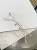 Nova Armação de Óculos Elegante Sem Aro com Borda Cortada Armação de Óculos Ultra-Leve de Titânio Puro Celebridade da Internet Anti-Luz Azul Pode Ser Equipada com Miopia