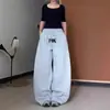 Pantalones de chándal casuales holgados con estampado de letras estilo americano para mujer, pantalones deportivos cálidos y versátiles para otoño e invierno, pantalones largos