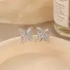 Pendientes de plata de ley S925 con circonita ultra brillante de alta gama para mujer, lujo ligero, exquisitos y elegantes, pendientes de botón populares al por mayor, estilo festivo