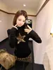 Camiseta de Manga Larga con Estampado de Leopardo y Estrellas Estilo Americano Picante para Mujer, Diseño de Primavera Chic Ajustada Cuello Alto Medio Camiseta Base