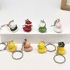 Chaveiro Pingente Criativo Variado Pato Amarelo Resina Pato Presente de Formatura Estudante Caixa Surpresa Buraco Música
