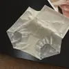 Panty de encaje bordado para mujer de cintura alta, sin costuras, transpirable, con fuelle de algodón extendido y un ligero diseño reductor de abdomen, disponible para venta al por mayor