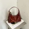 Bolso de axila para mujer, nueva colección primavera/verano 2026, simple y casual, bolso de hombro versátil, con un diseño sofisticado y retro, y gran capacidad