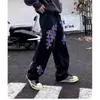 Verano Transfronterizo Nueva Marca de Moda Estilo Americano High Street Parche de Cuero Jeans Cruzados Unisex Sueltos Casual Vintage Pantalones Largos