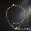 Venta al por mayor del fabricante marca D 2026 nuevo producto collar de doble capa con letra CD de margarita pequeña, pulsera, pendientes, conjunto de moda de lujo ligero