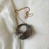 Bolsa de Dumpling com Corrente de Acrílico 2025 Nova Moda Europeia e Americana Nicho Bolsa de Ombro Versátil Feminina Bolsa Brilhante para Jantar