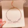 Pulsera Colgante Mariposa de Circonita Super Brillante Lujo Ligero Moda de Alta Gama Exquisito Anillo de Mano Dulce Versátil Nicho Joyería de Mano para Mujeres