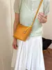 Bolsa de balde trançada vintage da moda para comércio exterior, bolsa de ombro de nicho de moda transfronteiriça, bolsa transversal versátil casual para o dia a dia