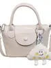 Bolsa Feminina 2026 Chegada Nova de Verão Design de Nicho Versátil Moda Textura Exquisita Pequena Bolsa Quadrada Bolsa de Ombro Transversal Estilo Coreano
