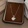 Collar de Borla de Perla con Bola de Flor de Zircón Estilo Francés de Lujo Ligero Cadena de Clavícula de Nicho Sentido del Diseño Joyería de Alta Gama Collar al por Mayor